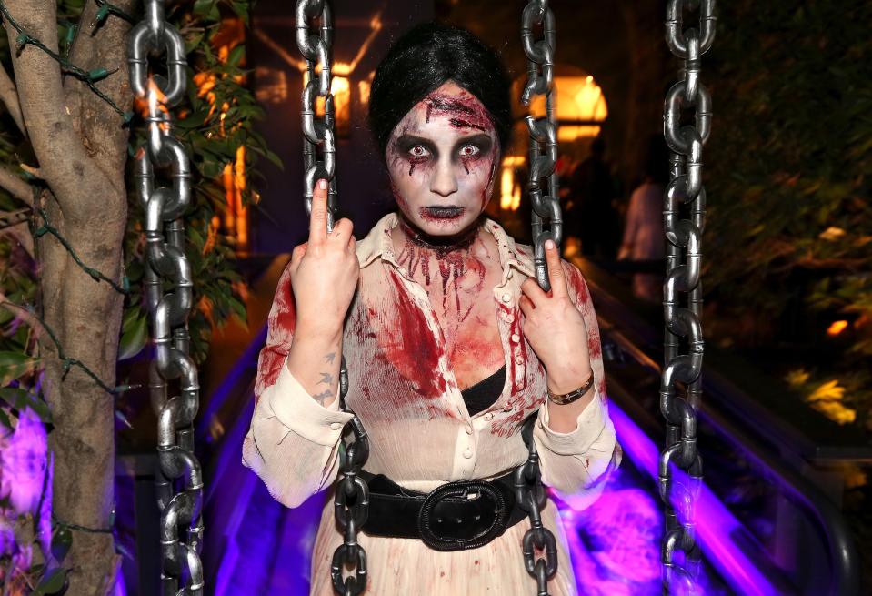 Demi Lovato proves that dressing up as a zombie for Halloween is a classic for a reason. Go heavy on the black eyeliner, smudge fake blood all over your face, and…well, that's really all there is to it.