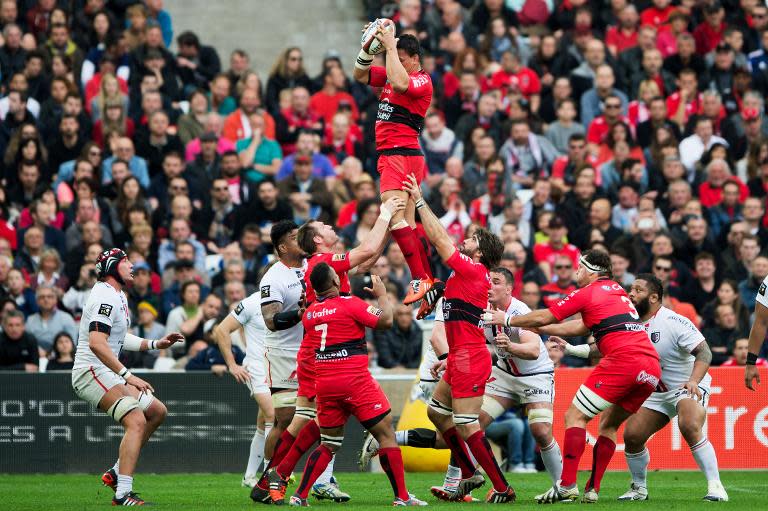 Toulon's No. 8 Chris Masoe grabs the ball in a line-out during their French Top 14 rugby union match against Toulouse, at the Velodrome stadium in Marseille, south-eastern France, on March 28, 2015