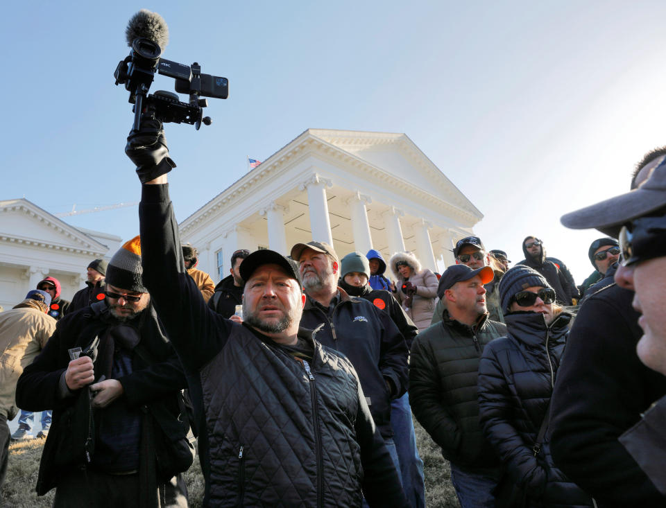 American radio host Alex Jones films the crowd inside the no-gun zone during a gun rights rally in front of the Virginia State Capitol building, in Richmond, Virginia, U.S. January 20, 2020.  REUTERS/Jonathan Drake (Photo: Jonathan Drake / Reuters)