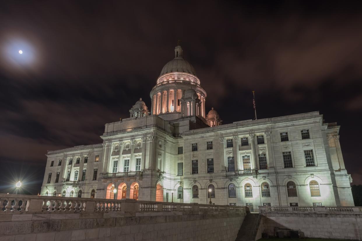 The Rhode Island State House is seen on a more peaceful night.