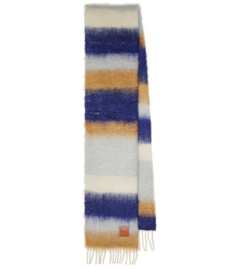 <p><a href="https://go.redirectingat.com?id=74968X1596630&url=https%3A%2F%2Fwww.mytheresa.com%2Fen-us%2Floewe-striped-mohair-and-wool-scarf-2276900.html&sref=https%3A%2F%2Fwww.oprahdaily.com%2Flife%2Frelationships-love%2Fg42124074%2Funique-gifts-for-women%2F" rel="nofollow noopener" target="_blank" data-ylk="slk:Shop Now;elm:context_link;itc:0;sec:content-canvas" class="link ">Shop Now</a></p><p>Stripled Mohair and Wool Scarf</p><p>mytheresa.com</p><p>$350.00</p><span class="copyright">Loewe</span>