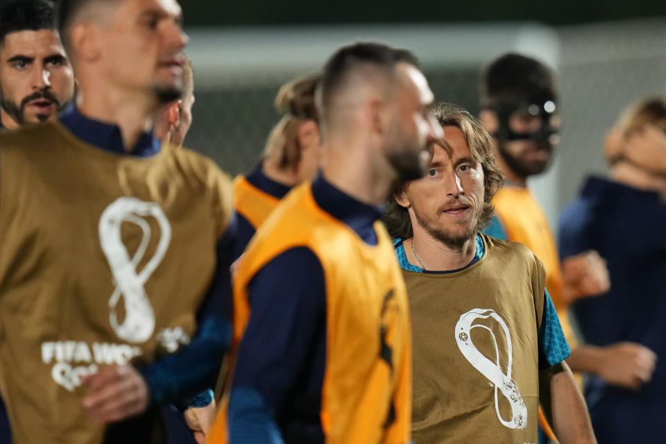 Croatia's Luka Modric and his teammates attend the training session on the eve of the 2022 World Cup semifinal soccer match between Croatia and Argentina in Doha, Monday, Dec. 12, 2022. (AP Photo/Petr David Josek)