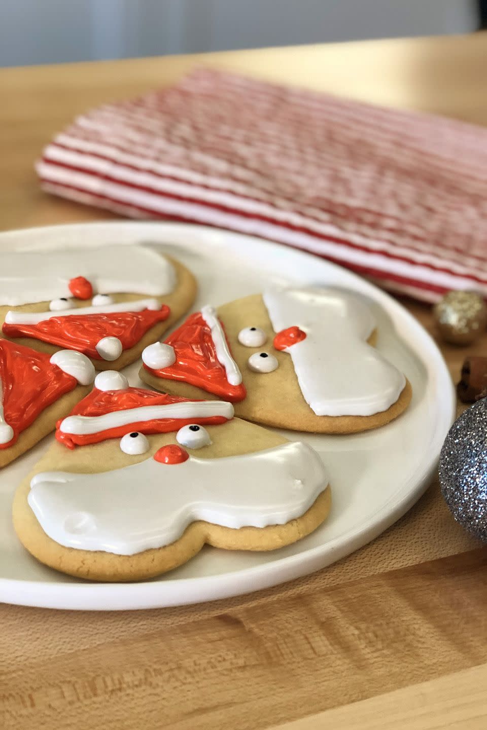 <p>Wear your heart on your sleeve with these adorable Santa treats. Just grab a heart-shaped cookie cutter and make basic <a href="https://www.goodhousekeeping.com/food-recipes/a6874/sugar-cookies-4477/" rel="nofollow noopener" target="_blank" data-ylk="slk:sugar cookies;elm:context_link;itc:0;sec:content-canvas" class="link ">sugar cookies</a>. With white frosting, add Santa's beard and eyes. Then use red frosting to add Santa's hat and rosy nose. Add the finishing touches with another round of white frosting for the hat and a dot of black frosting for the pupils.</p><p><a class="link " href="https://www.amazon.com/Ateco-Graduated-Heart-Cookie-Cutters/dp/B00004S1CK?tag=syn-yahoo-20&ascsubtag=%5Bartid%7C10055.g.2943%5Bsrc%7Cyahoo-us" rel="nofollow noopener" target="_blank" data-ylk="slk:Shop Now;elm:context_link;itc:0;sec:content-canvas">Shop Now</a><br></p>