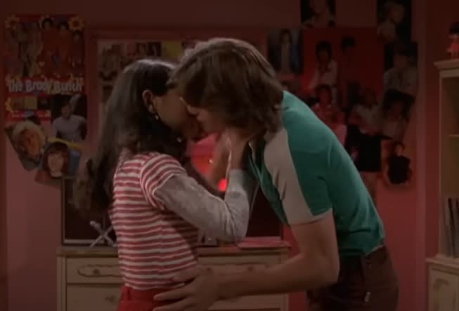 Mila and Ashton kissing on the show