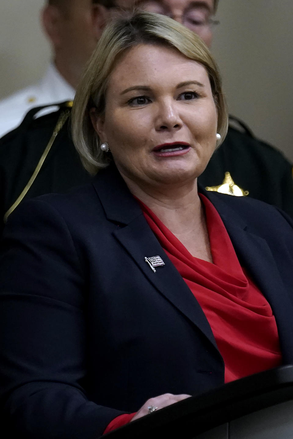 Judge Susan Lopez, Acting State Attorney for the 13th Judicial Circuit, speaks during a news conference with Florida Gov. Ron DeSantis Thursday, Aug. 4, 2022, in Tampa, Fla. DeSantis announced that he was suspending State Attorney Andrew Warren, of the 13th Judicial Circuit, due to "neglect of duty." (AP Photo/Chris O'Meara)