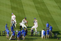 A Citi Field crew sets up giant cardboard cutouts of pitcher Ron Darling, right, pitcher Jon Matlack, center, and infielder Edgardo Alfonzo ahead of a New York Mets Hall of Fame ceremony, Saturday, July 31, 2021, in New York. (AP Photo/Mary Altaffer)