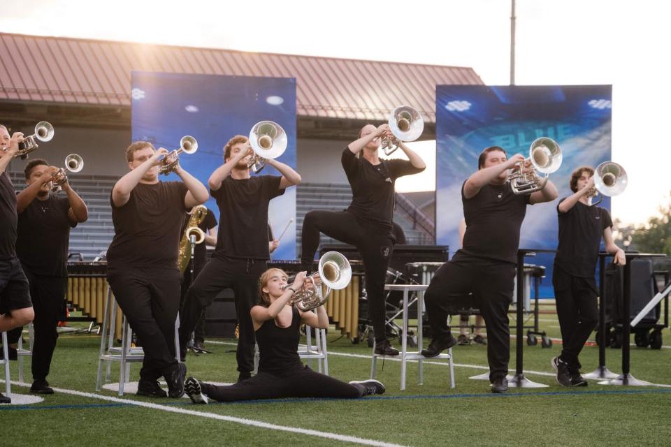 Bluecoats perform at Kehres Stadium, in Alliance, in early July. A Drum & Bugle Corps competition will blend the artistic merits of a brass band concert with the physicality and pageantry of gymnastics or figure skating when it takes place in Orrville on Friday, Aug. 3