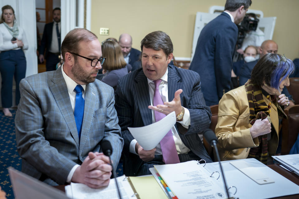 House Ways and Means Committee Chairman Jason Smith, R-Mo., left, and House Budget Committee Chairman Jodey Arrington, R-Texas, confer before the House Rules Committee meets to prepare Speaker Kevin McCarthy's debt ceiling package for the floor, on Capitol Hill in Washington, Tuesday, April 25, 2023. (AP Photo/J. Scott Applewhite)