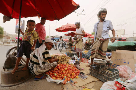 A street vendor sells vegetables in the Red Sea port city of Hodeidah, Yemen, June 14, 2018. REUTERS/Abduljabbar Zeyad