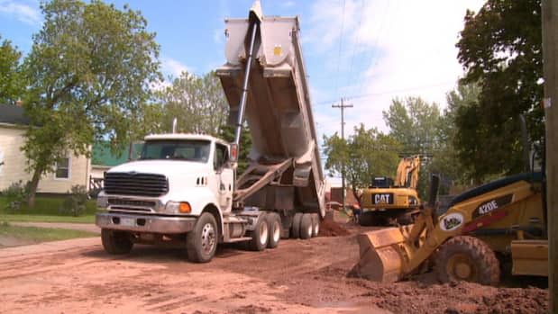 The more new homes a community builds, the more work on municipal streets, sewers and sidewalks will be needed. (CBC - image credit)