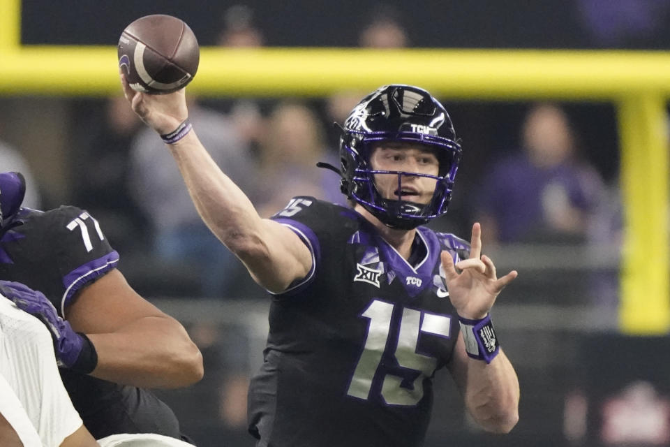 TCU quarterback Max Duggan (15) throws in the first half of the Big 12 Conference championship NCAA college football game against Kansas State, Saturday, Dec. 3, 2022, in Arlington, Texas. (AP Photo/LM Otero)