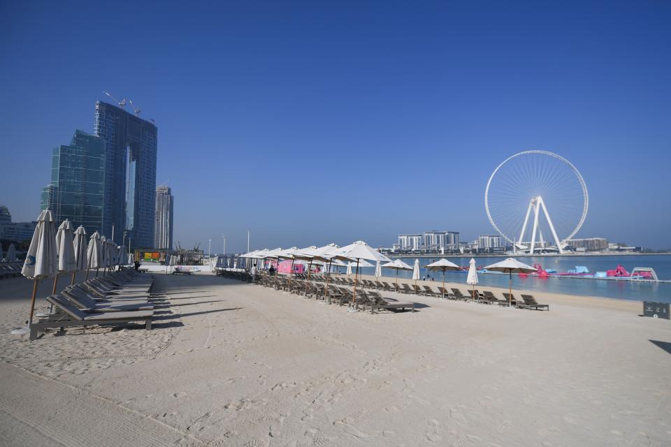 Empty sunbeds at Jumeirah Beach Residence in Dubai on March 12, 2020.