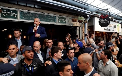 Israeli Prime Minister Benjamin Netanyahu speaks as he visits Mahane Yehuda Market a day ahead of Israeli national elections - Credit: REUTERS/Ronen Zvulun