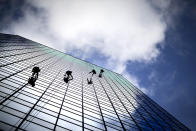 <p>Window washers descend the 36-story Centennial Tower downtown skyscraper, Dec. 4, 2013, in Atlanta. (AP Photo/David Goldman) </p>