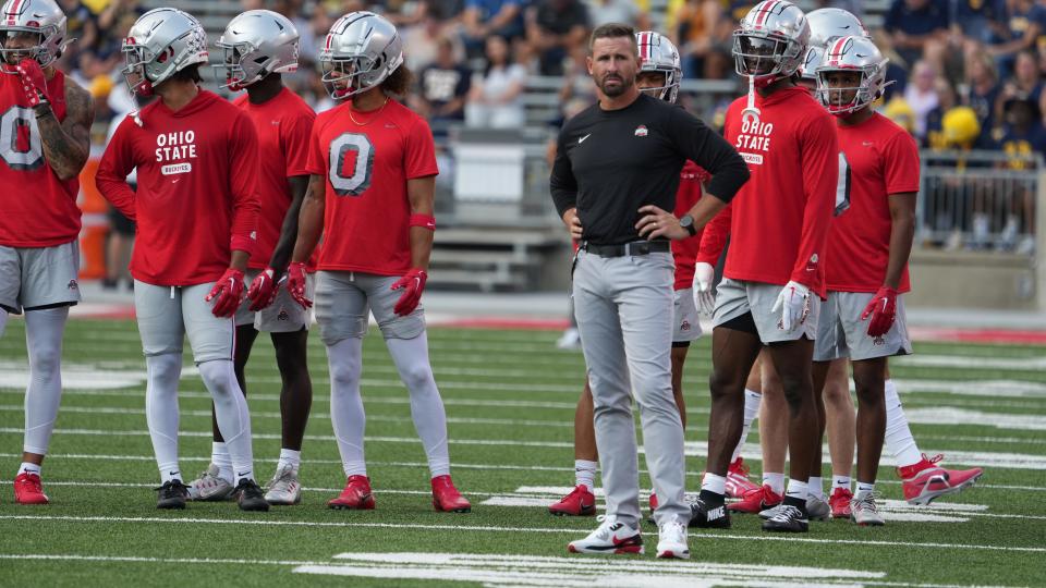 Sep 16, 2022; Columbus, Ohio, United States; Passing game coordinator and wide receivers coach Brian Hartline during warmups against Toledo. Mandatory Credit: Doral Chenoweth/The Columbus Dispatch