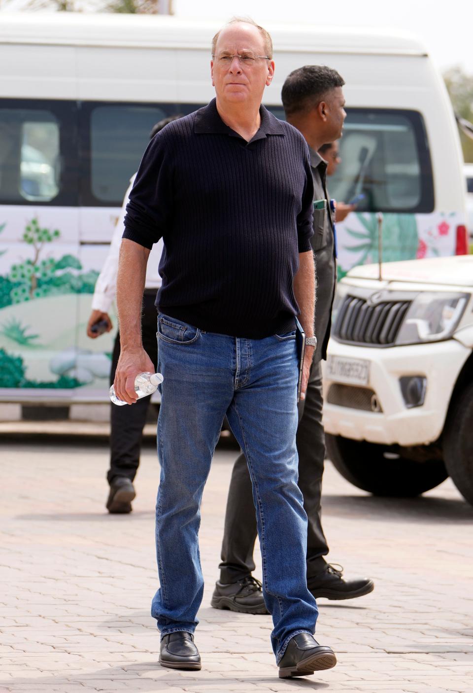 Larry Fink, chairman and CEO of BlackRock. arrives to attend a pre-wedding bash of billionaire industrialist Mukesh Ambani's son Anant Ambani, in Jamnagar, India, Friday, March 1, 2024. (AP Photo/Ajit Solanki) ORG XMIT: XAS141