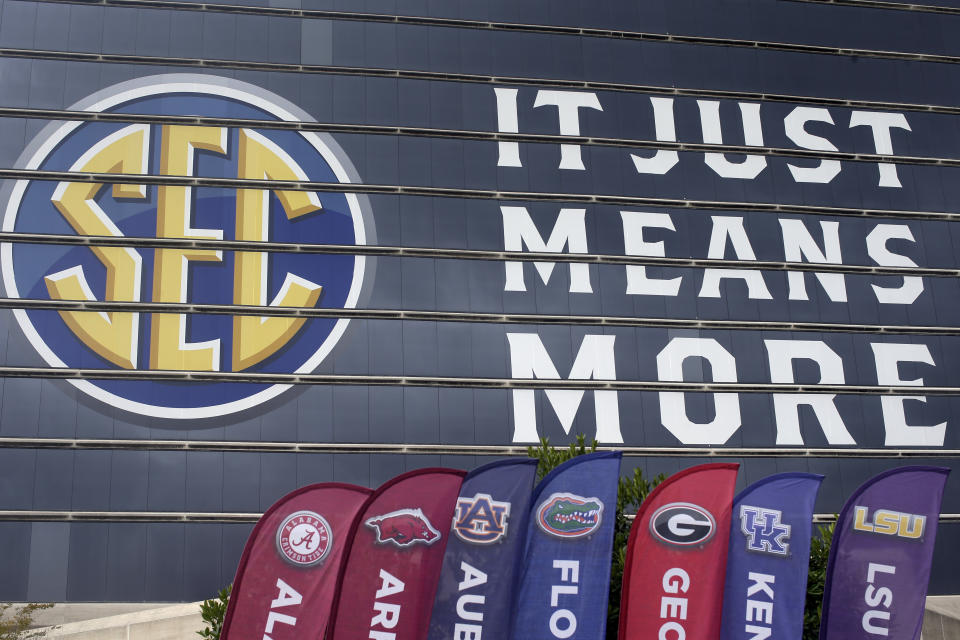 The SEC logo is displayed at the Hyatt Regency hotel, site of the NCAA college football Southeastern Conference Media Days, Monday, July 19, 2021, in Hoover, Ala. (AP Photo/Butch Dill)