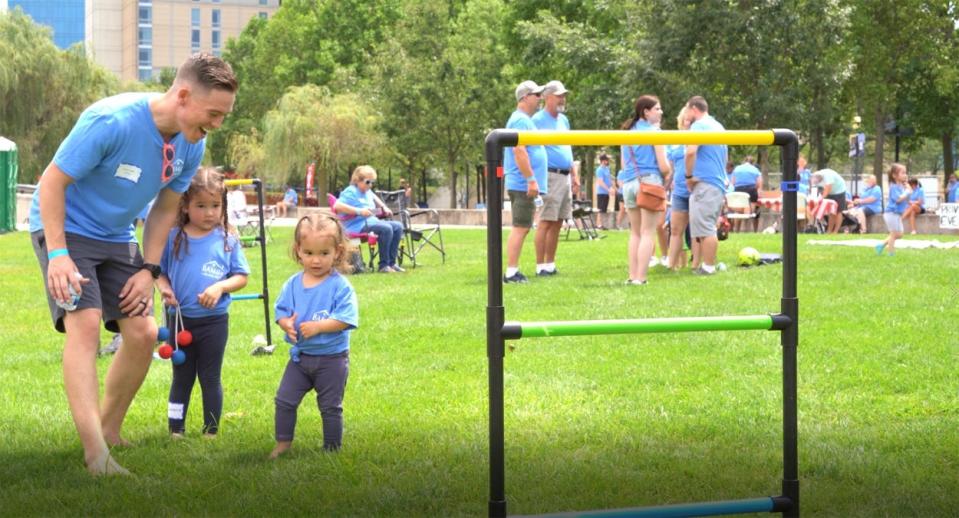 Employees from the BAM Companies take part in a family outing.