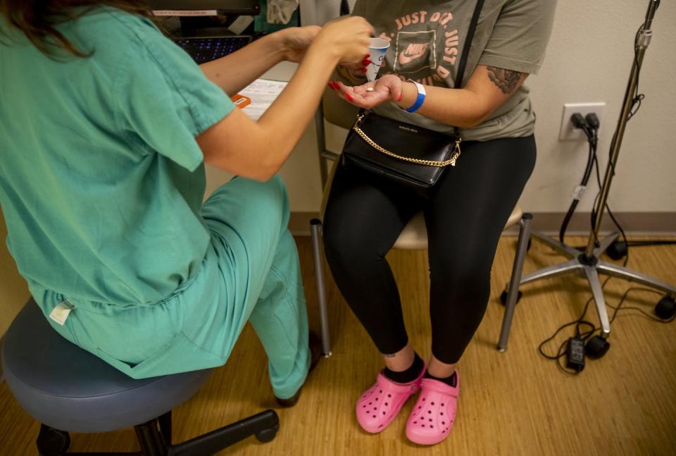 Until now, most abortion drugs have been dispensed in person at clinics. <a href="https://www.gettyimages.com/detail/news-photo/resident-gives-a-25-year-old-woman-medication-to-terminate-news-photo/1241513931" rel="nofollow noopener" target="_blank" data-ylk="slk:Gina Ferazzi / Los Angeles Times via Getty Images;elm:context_link;itc:0;sec:content-canvas" class="link ">Gina Ferazzi / Los Angeles Times via Getty Images</a>