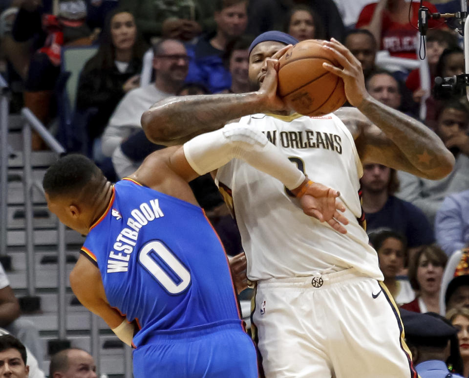 DeMarcus Cousins got a flagrant-2, and automatic ejection, for this elbow on Russell Westbrook. (AP)