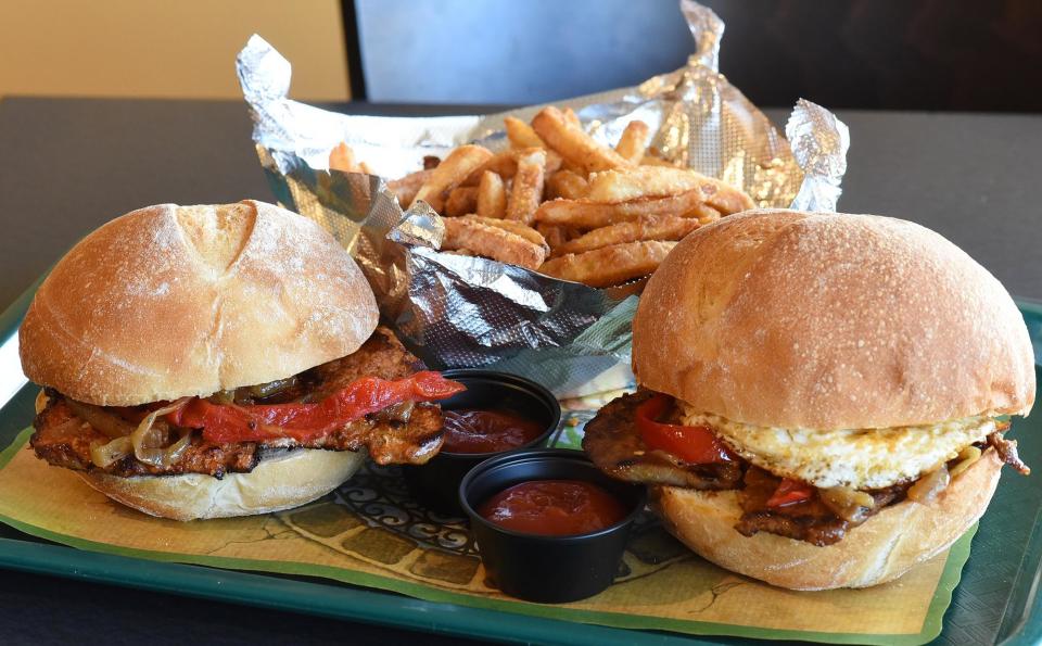 Fall River favorites, the bifana, left, and Portuguese steak sandwich.