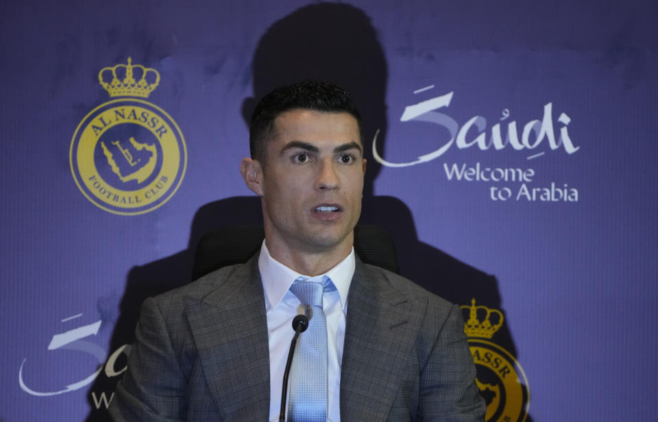 Cristiano Ronaldo attends a press conference for his official unveiling as a new member of Al Nassr soccer club in in Riyadh, Saudi Arabia, Tuesday, Jan. 3, 2023. Ronaldo, who has won five Ballon d'Ors awards for the best soccer player in the world and five Champions League titles, will play outside of Europe for the first time in his storied career. (AP Photo/Amr Nabil)