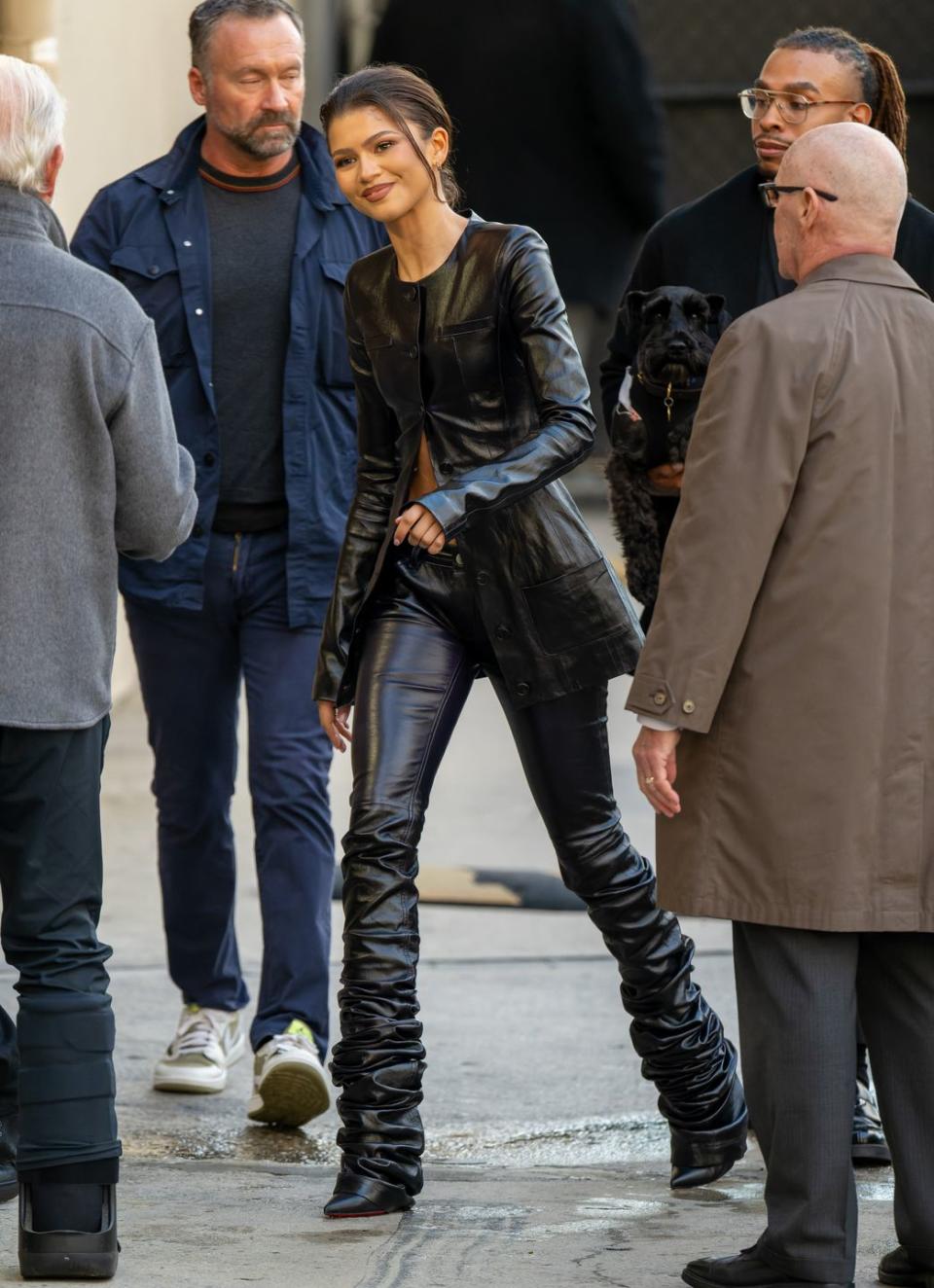 Zendaya Wore an Half-Unbuttoned Leather Top With Flares to Promote ...