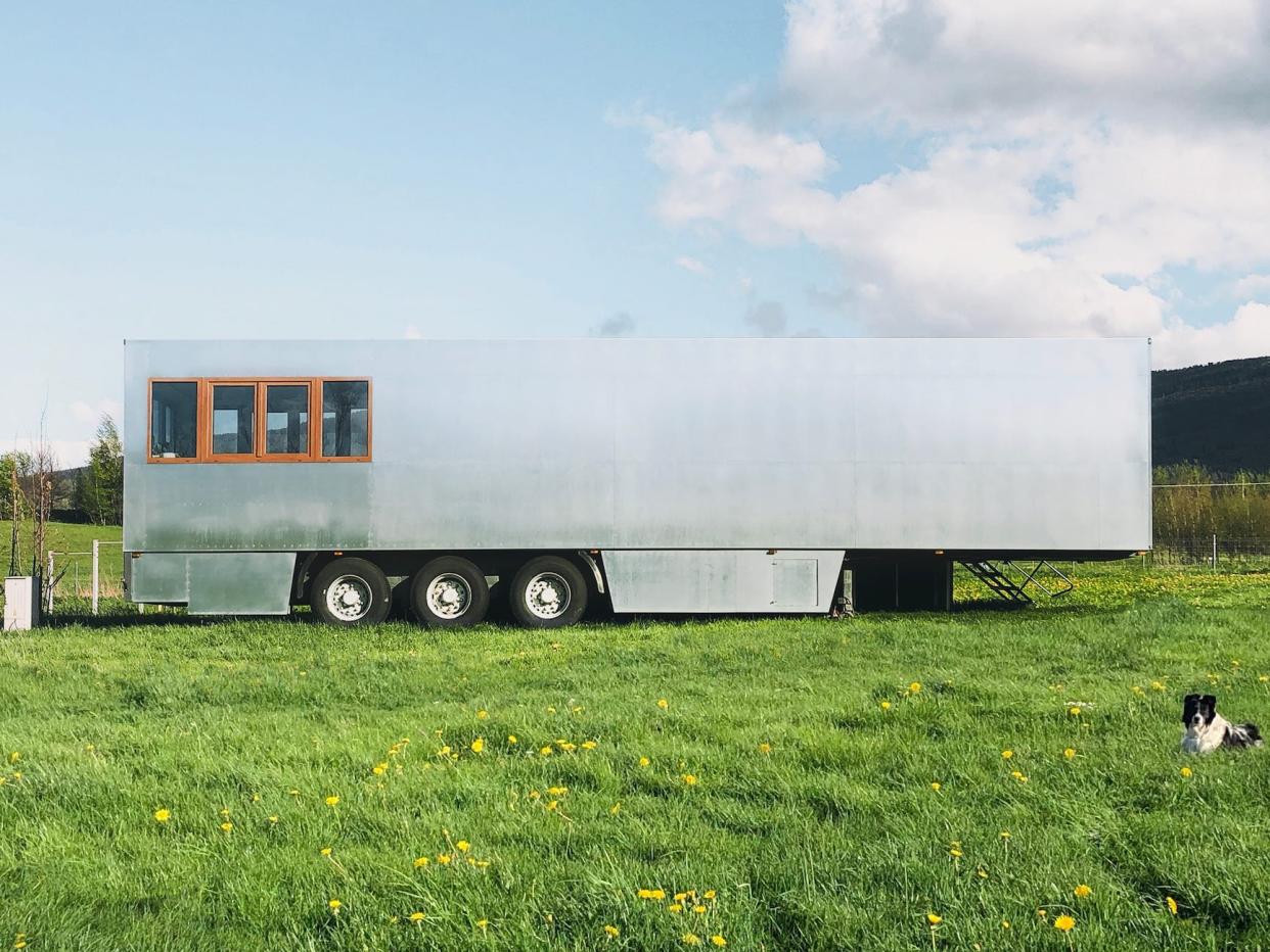 the Good Spot mobile hotel on a field