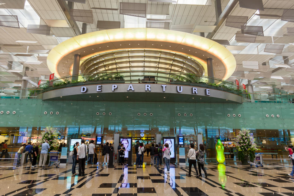 People at Singapore Changi Airport Terminal. It is currently rated the World's Best Airport by Skytrax for the eighth consecutive year since 2013.