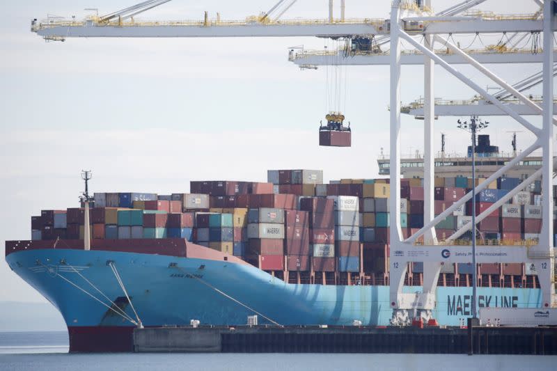 FILE PHOTO: The ship Anna Maersk gets containers unloaded at Roberts Bank port including 69 containers of mostly paper and plastic waste returned by the Philippines