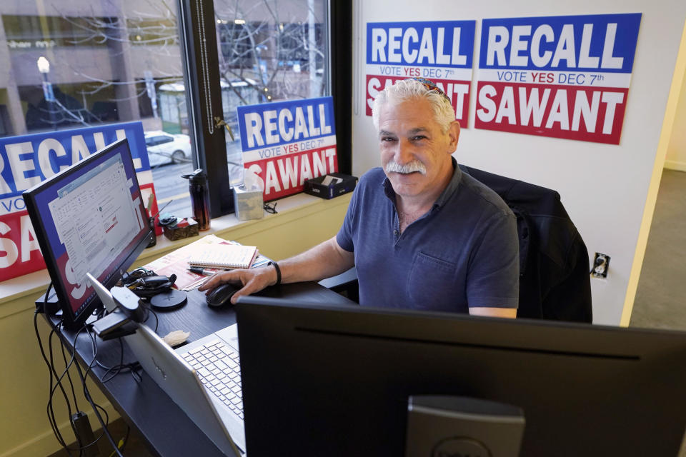 Henry Bridger II, a former supporter of Seattle city councilmember Kshama Sawant who is leading an effort to recall her, poses for a photo Thursday, Dec. 2, 2021 in Seattle. Ballots are due Tuesday, Dec. 7, 2021 in Seattle's Third District, and the results could further shift power in the Northwest's largest city and deal another setback to leftist activists who saw business-friendly candidates win a council seat and the mayor's office in the November 2021 general election. (AP Photo/Ted S. Warren)