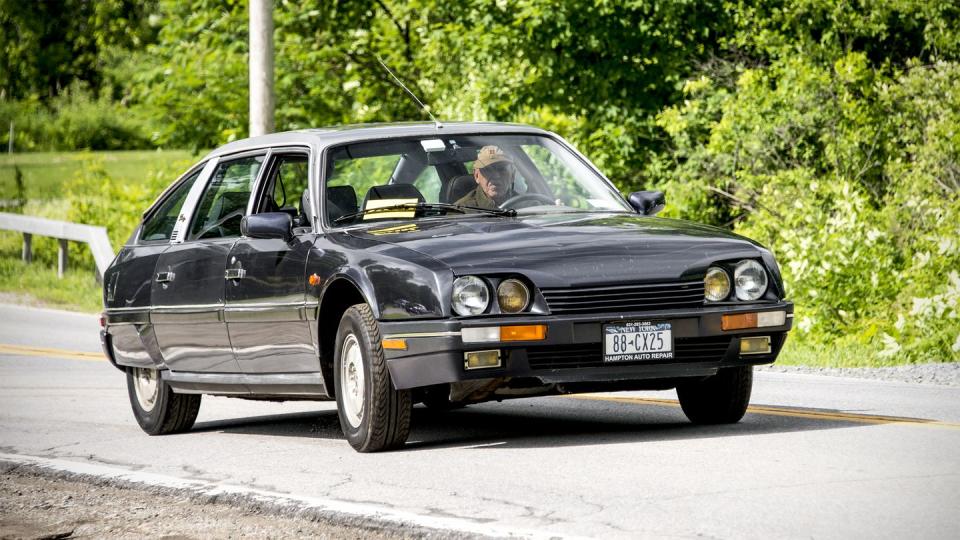 a person driving a citroen cx