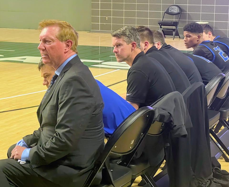 Northside Christian coach Tim Kusan watches the action during a 52-32 loss to Berlin Hiland on Tuesday in a Division IV regional semifinal at Ohio University.