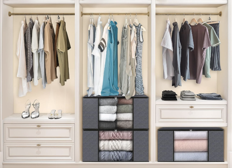 A set of gray storage bags in a neat-looking closet for organization