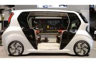 <p>LG’s connected self-driving car is like a <strong>home office </strong>on wheels. The concept is 10 years away from production, but at the CES show in 2020 it was a taster of what tech companies think the future of <strong>autonomous cars</strong> will be like. As you approach it, it already recognises you through <strong>facial recognition </strong>and assigns you to one of its four recliner seats. Each chair has a controller and a touch screen for a truly personalised experience.</p><p>And with AI and cloud tech, you can pick up TV shows and movies right where you left off. Press a button, and a <strong>snack tray </strong>rolls out from underneath your seat. Instead of a windscreen, a huge <strong>OLED display</strong> gives you a real-time view of the road.</p>