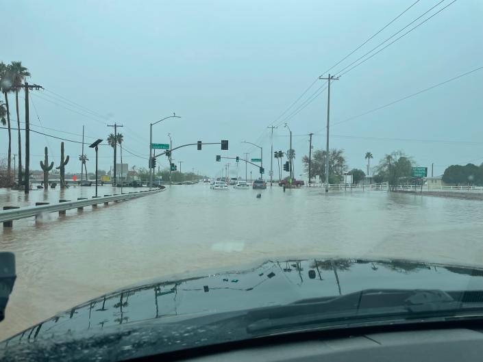 Flooding as a result of heavy rainfall at the intersection of South Sunland Gin Road and West Battaglia Drive in Arizona City.