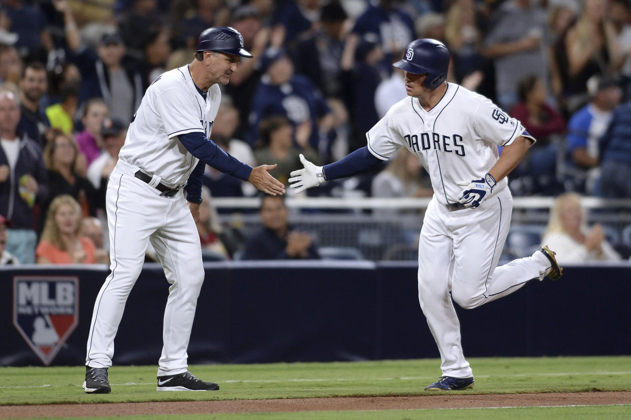 Hunter Renfroe (right) was hot to trot in Wednesday’s slugfest against Arizona (AP)