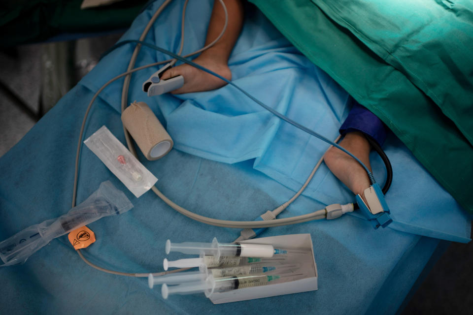 Abdulrahman, 2, lies on an operating table as he is prepared for heart surgery at the Tajoura National Heart Center in Tripoli, Libya, on Feb. 24, 2020. (AP Photo/Felipe Dana)