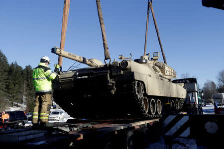 U.S. M1 Abrams tank which will be deployed in Latvia for NATO's Operation Atlantic Resolve is unloaded in Garkalne, Latvia February 8, 2017. REUTERS/Ints Kalnins