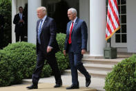 U.S. President Donald Trump and Vice President Mike Pence attend a National Day of Prayer event at the Rose Garden of the White House in Washington D.C., U.S., May 4, 2017. REUTERS/Carlos Barria