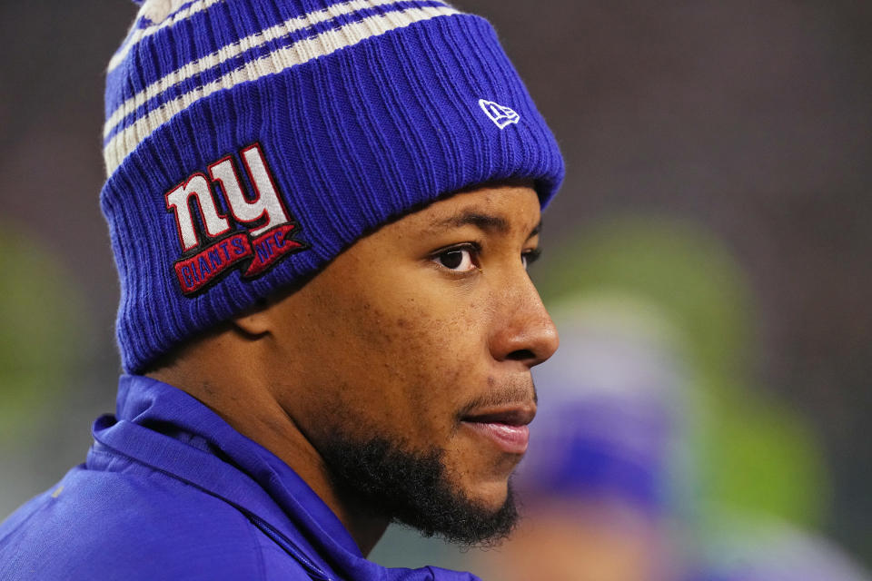 Giants running back Saquon Barkley spoke candidly about his contract situation over the weekend. Key figures elsewhere on the team haven't directly responded, but reading between the lines reveals plenty. (Photo by Mitchell Leff/Getty Images)