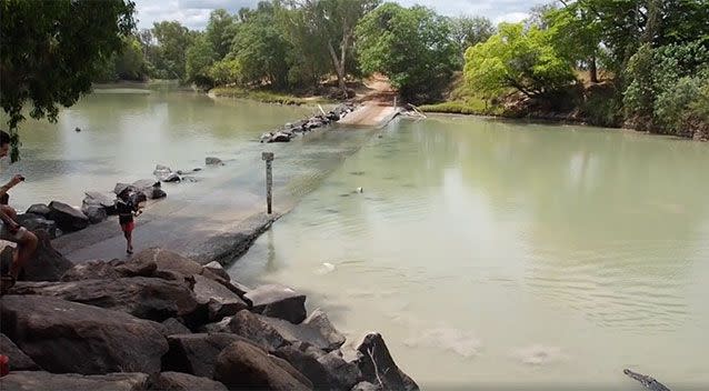 A fisherman has been filmed having his catch stolen from him by a croc in the NT. Source: Facebook/ Bonker's Adventure