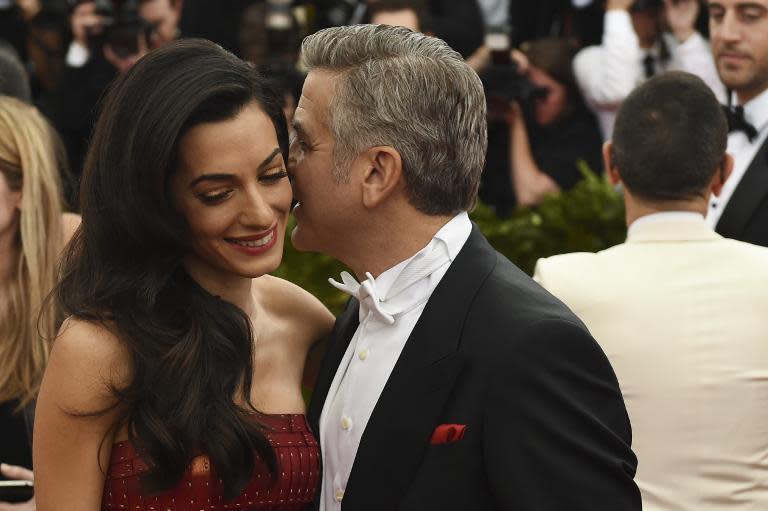 Amal and George Clooney arrive for the Costume Institute Gala Benefit at The Metropolitan Museum of Art, in New York, on May 5, 2015