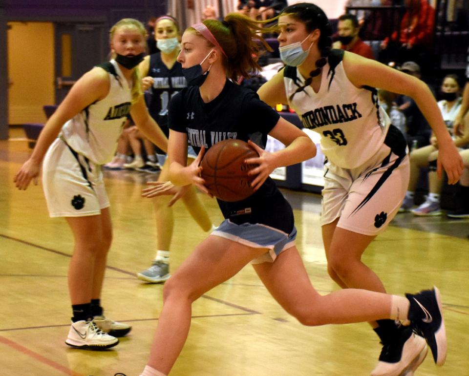 Central Valley Academy's Madison Obreza drives the baseline past Adirondack defenders during a first round game at the Kasner Klassic Tuesday in Little Falls.