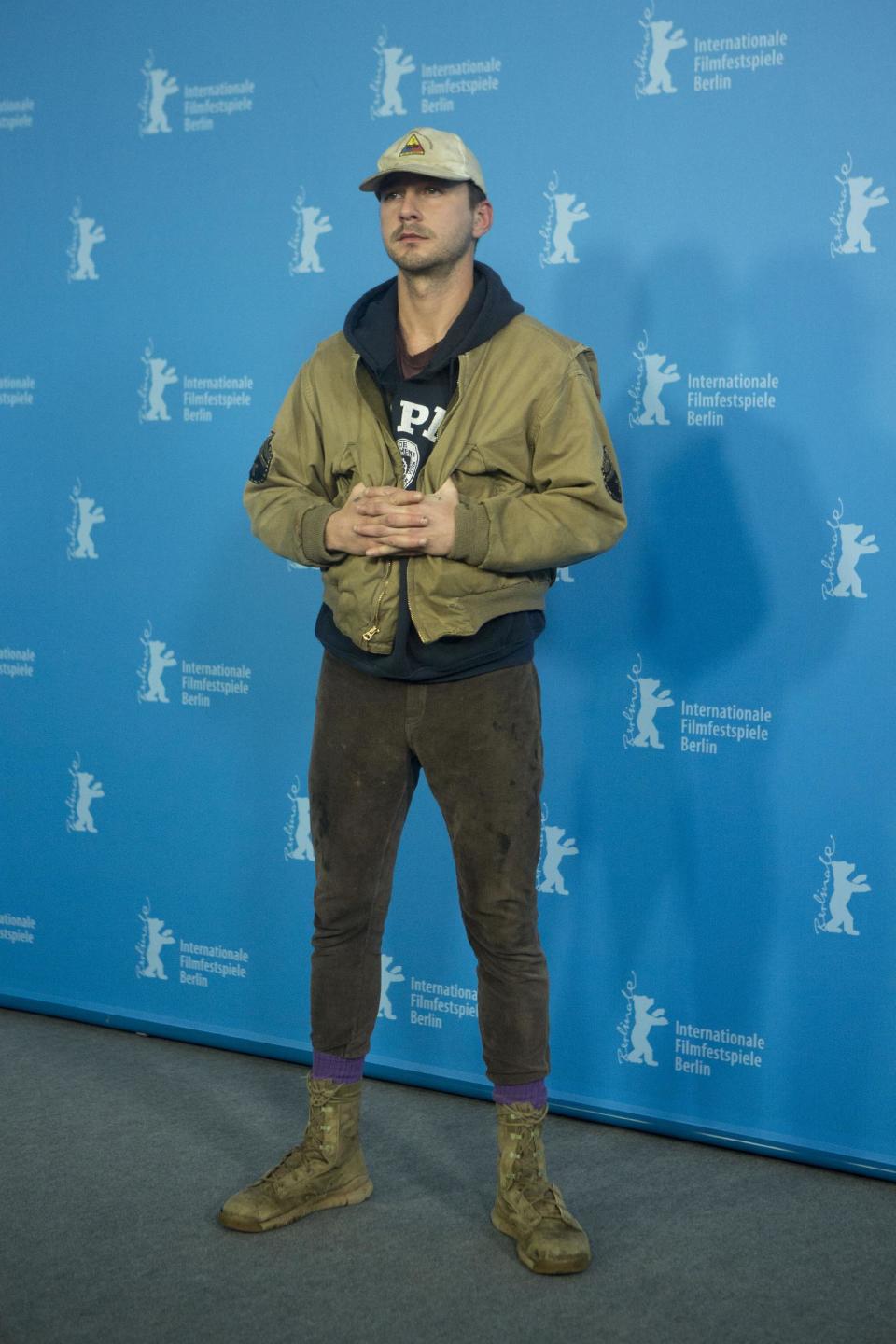 Actor Shia LaBeouf poses for photographers at the photo call for the film Nymphomaniac at the International Film Festival Berlinale in Berlin, Sunday, Feb. 9, 2014. (AP Photo/Axel Schmidt)