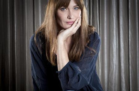 Singer Carla Bruni-Sarkozy poses for a portrait as she promotes her new album "Little French Songs" in New York, June 25, 2013. REUTERS/Carlo Allegri