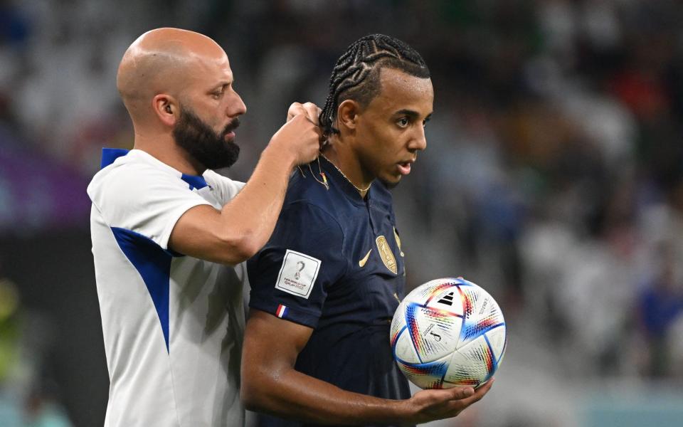 'A little taste of Sunday league': France's Jules Kounde has to remove necklace during Poland match - AFP