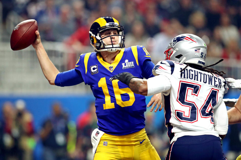 Los Angeles Rams quarterback Jared Goff drops back to pass during the third quarter against New England Patriots linebacker Dont'a Hightower in Super Bowl LIII on Feb. 3, 2019 in Atlanta.