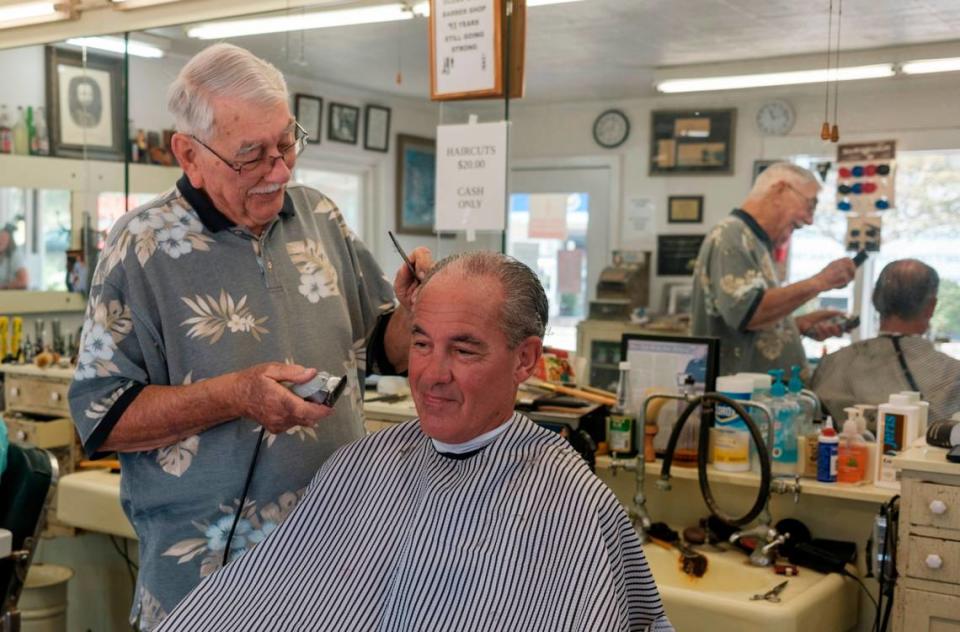 Bobby Lewis, age 82, got his start shining shoes and sweeping the floors in his father’s barber shop that was opened in 1952. Ocean Drive Barber Shop has been. The barber shop is recognized as being one of the oldest in the state. His brother and partner, Lynwood Lewis, worked beside him cutting hair until he retired a few years ago. September 25, 2023.