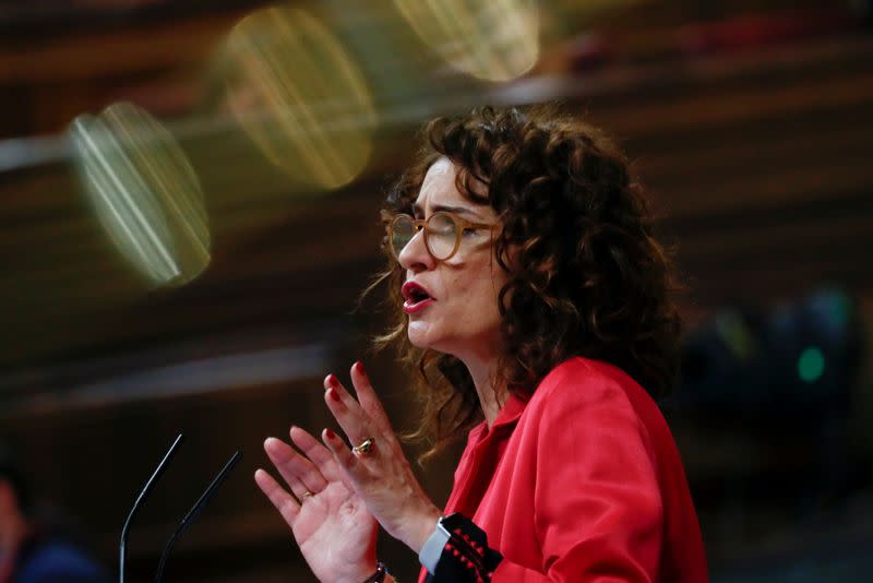 FILE PHOTO: Spain's Treasury Minister Maria Jesus Montero attends a session at Parliament in Madrid